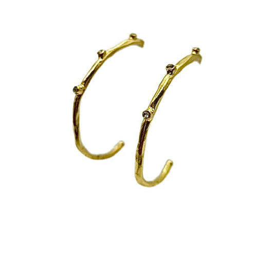 handmade 21 karat gold plated hammer finished hoop earrings with cz accents