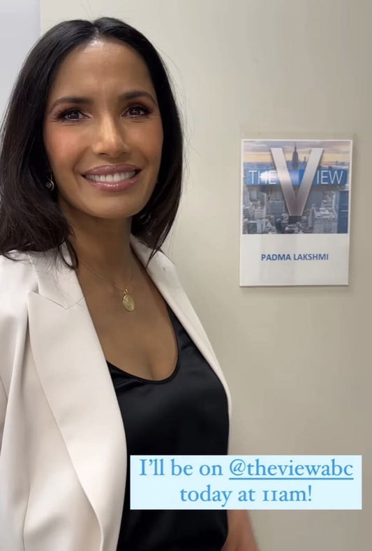 Padma Lakshmi on The View wearing Bebek Jewels earrings & Bruno Cuccinelli pantsuit