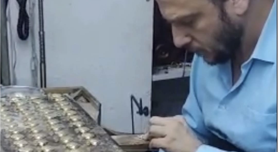 Artisan making jewelry