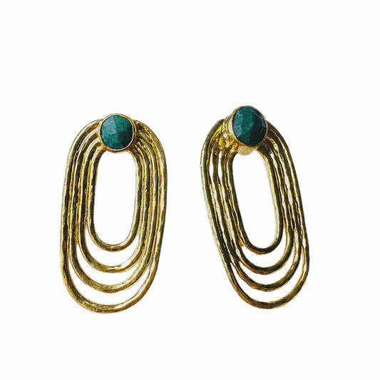 Artisanal Gold-plated paper clip earrings with green gemstones on a white backdrop
