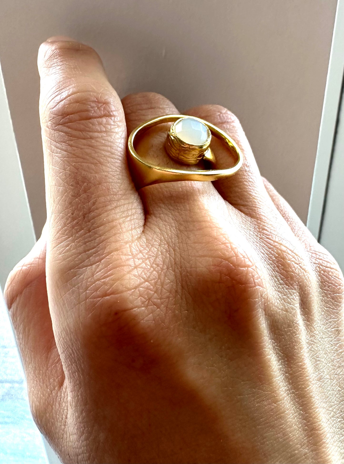Contemporary Dervish Gold and Snow Quartz Ring