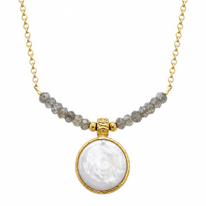 A gold chain minimal flat pearl pendant necklace with a row of small gray beads across upper center