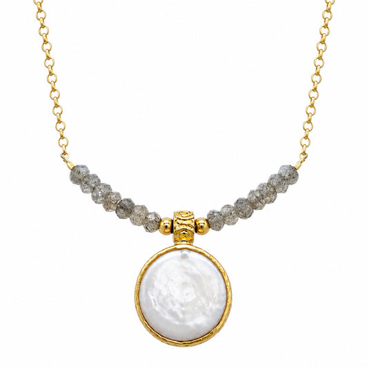 A gold chain minimal flat pearl pendant necklace with a row of small gray beads across upper center
