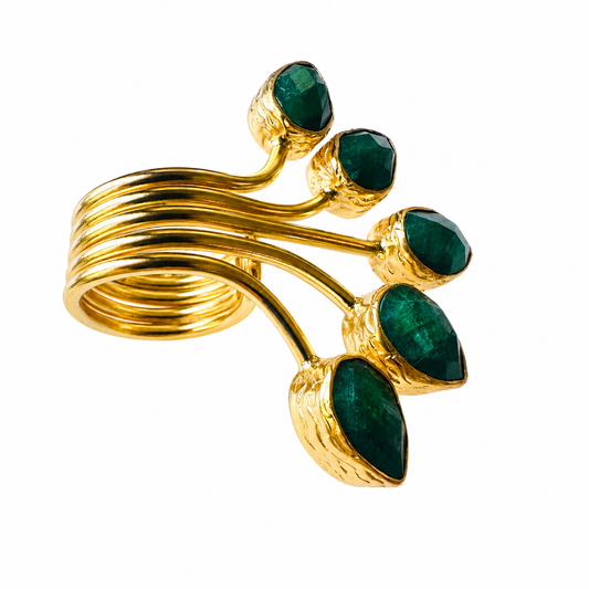 A gold-plated fan multi-stone emerald ring with five leaf-like branches, shown on a plain white background.