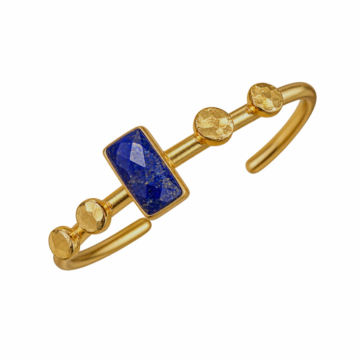 Gold bangle bracelet featuring a rectangular blue lapis lazuli stone and three round gold accents, set on a plain white background.