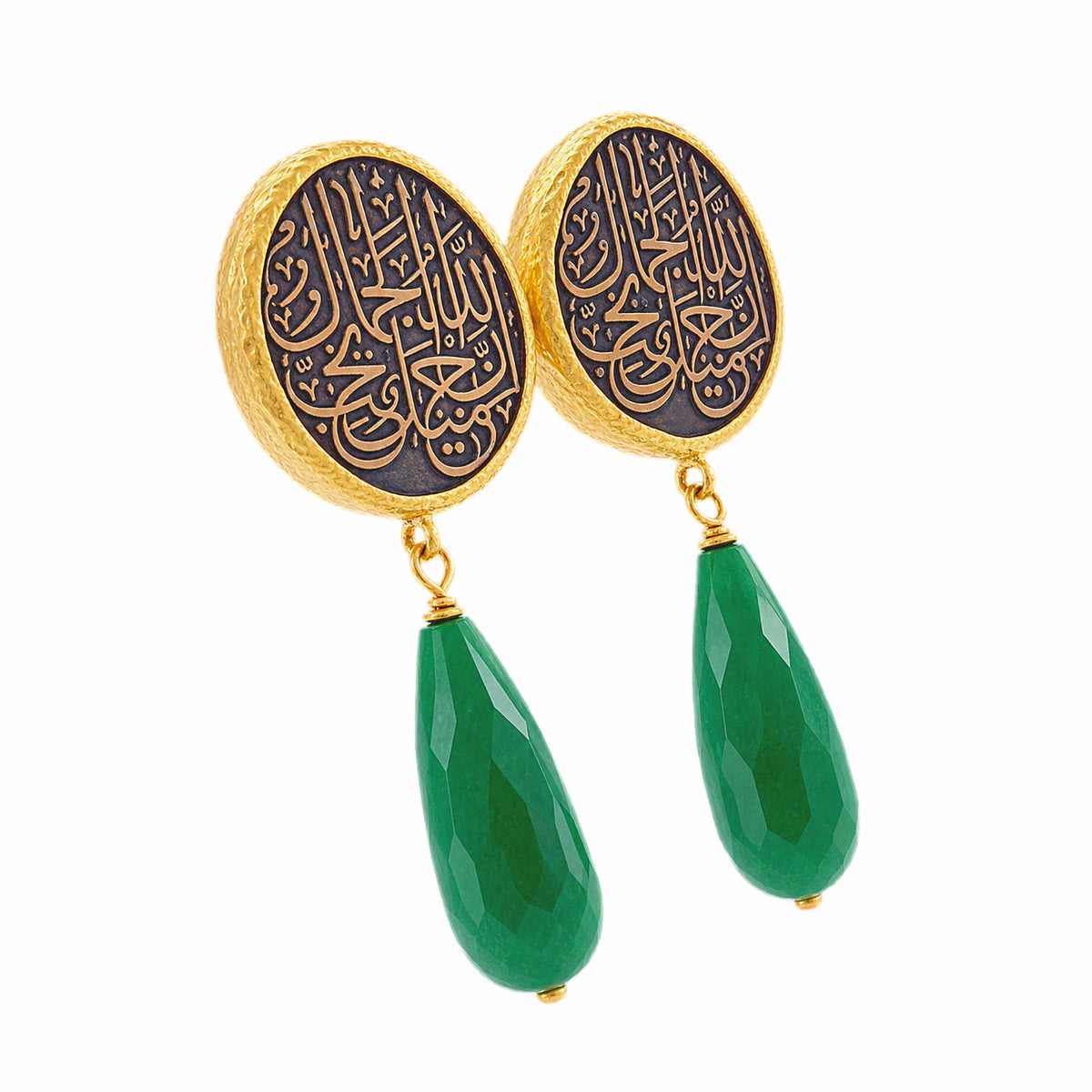 A pair of gold and black drop earrings featuring circular studs with Arabic calligraphy and dangling green Jade on a white background facing right 