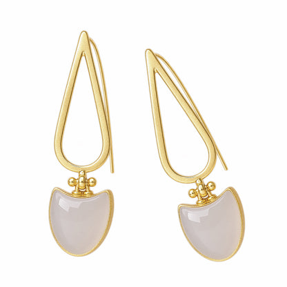 A pair of gold drop earrings featuring a teardrop-shaped gold frame and a curved, semi-circular snow Quartz stone dangle, shown on white background.