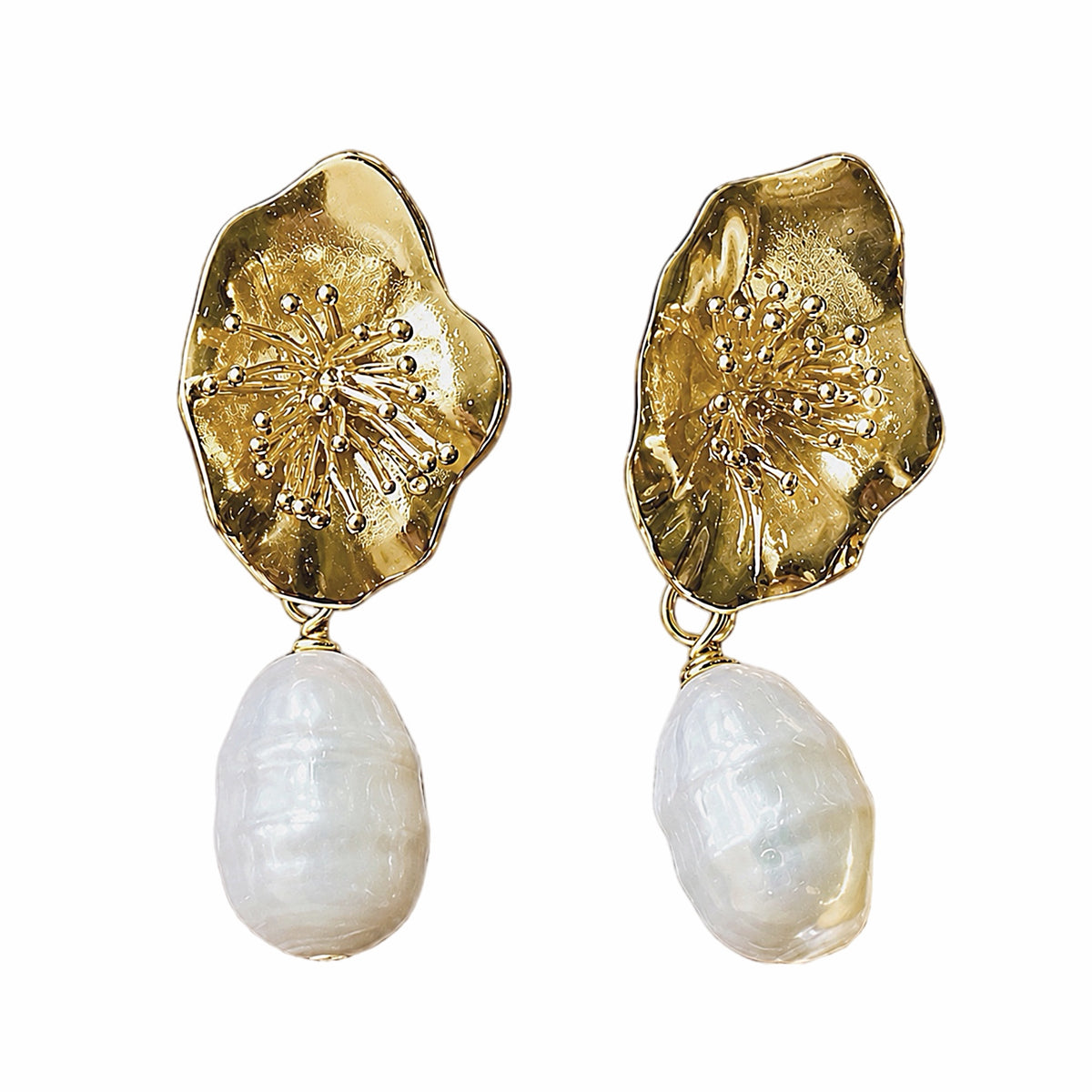 A pair of gold-plated flower dangle earrings featuring textured, dangling baroque white pearl drops, shown on a plain white background.