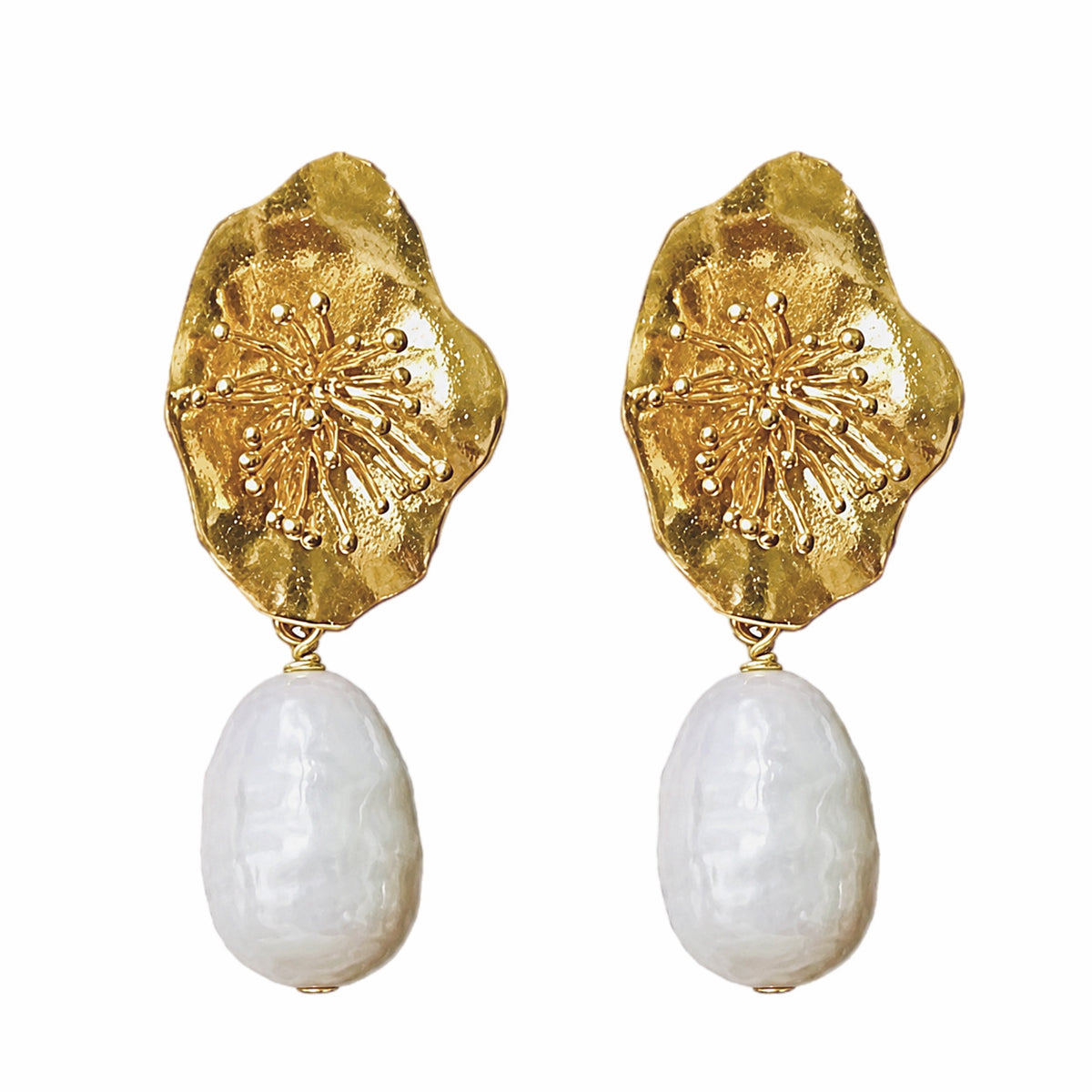 A pair of gold-plated flower dangle earrings featuring textured, dangling baroque white pearl drops, shown on a white background.