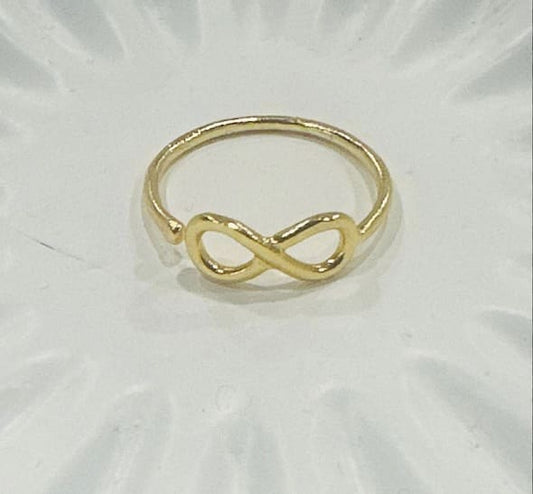 Adjustable Artisanal sustainable waterproof Gold-plated infinity ring on a white background