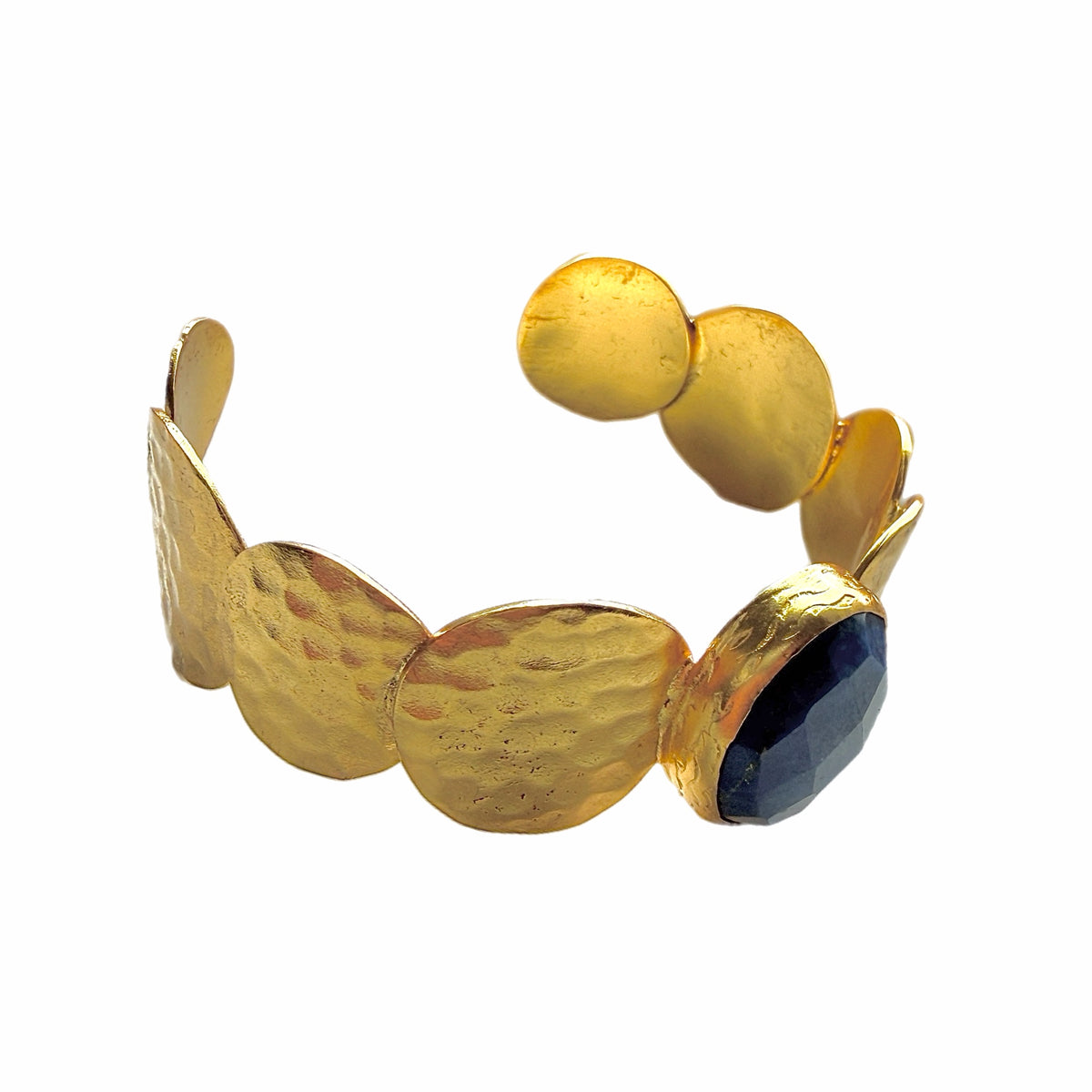 Gold-plated artisanal bracelet with a central blue lapis lazuli gemstone on a white background-facing-right