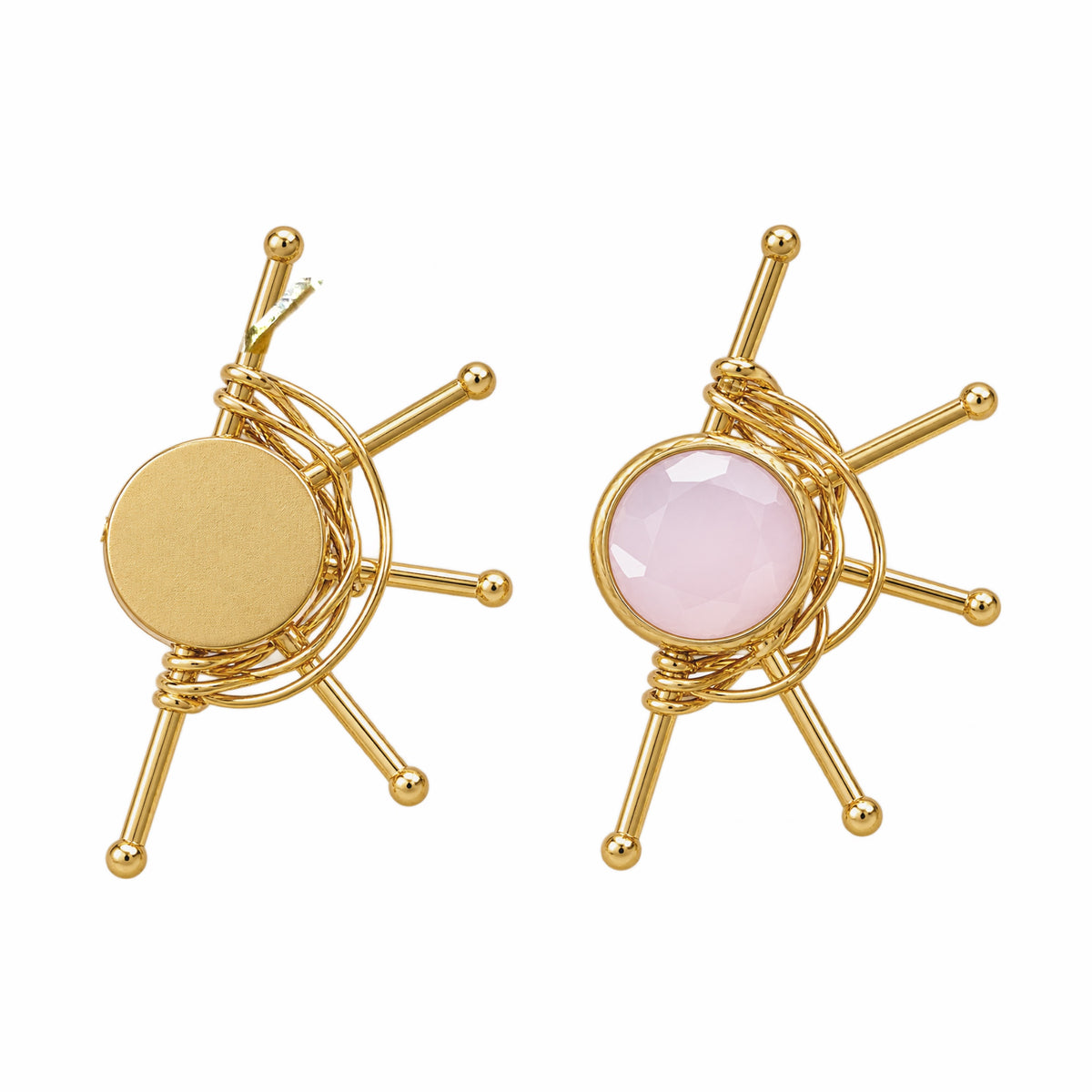 A pair of gold-plated geometric stud earrings a faceted pale pink rose quartz round stone on a white background.