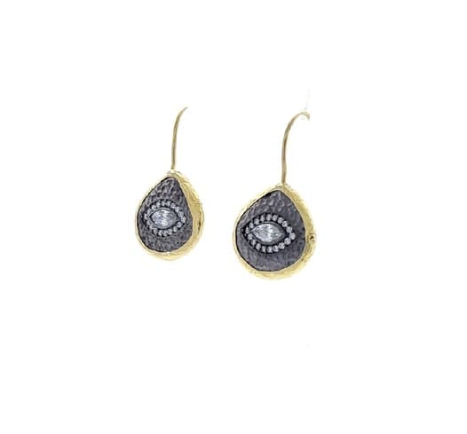 Handmade sustainable gold-plated hammer-finished silver teardrop stud earrings with cz evil eye facing left 