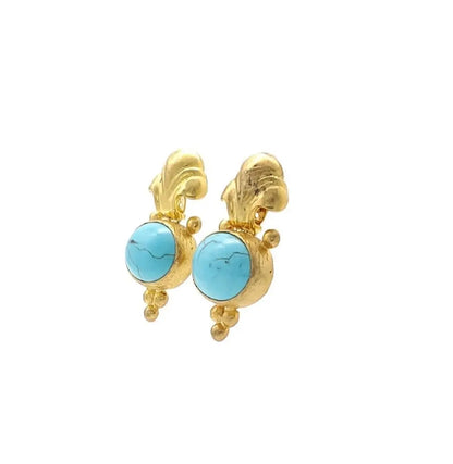 Gorgeous Gold-plated Fleur-de-lis turquoise earrings on a white background facing left 