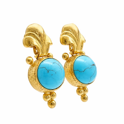 Beautiful handmade gold plated Fleur de lis gold plated turquoise fleur de lis earrings right side view