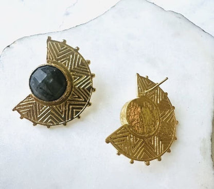 Handmade-sustainable-gold-plated-labrodorite-stud-earrings-with-one-facing-down-on-white-marble