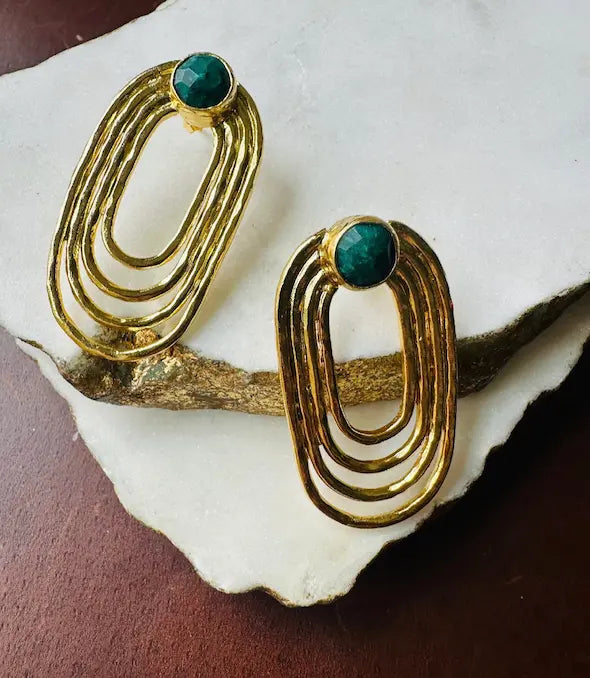 Handmade sustainable contemporary gold-plated ellipse stud earrings with emerald 