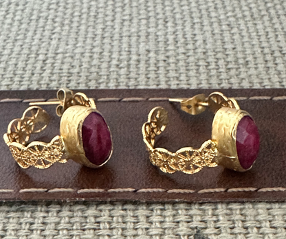 Handmade sustainable gold-plated lace ruby hoop earrings facing right 