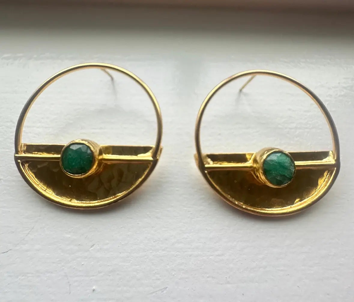 A pair of gold-plated hammer-finished half disc earrings with green jade accents, displayed against a white background