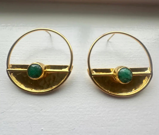 A pair of gold-plated hammer-finished half disc earrings with green jade accents, displayed against a white background
