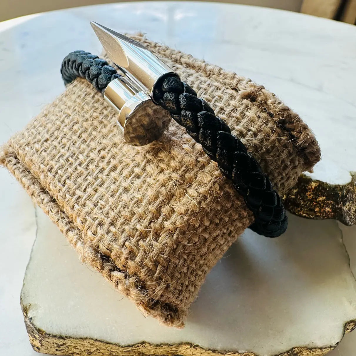 Handmade woven Bracelet with black braided strap and silver nail and arrow details 