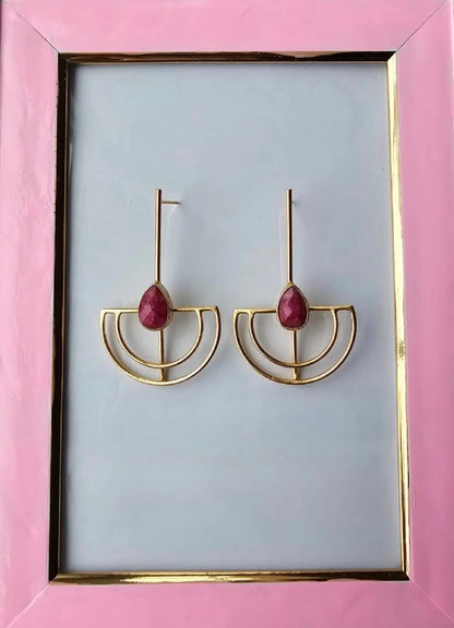 Gold-plated sustainable contemporary earrings with ruby gemstones in a pink frame