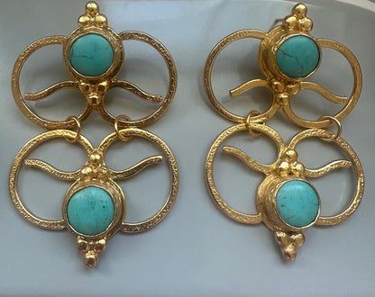 Handmade sustainable gold-plated bold dangle earrings with abstract geometric design and round turquoise gemstones at the center