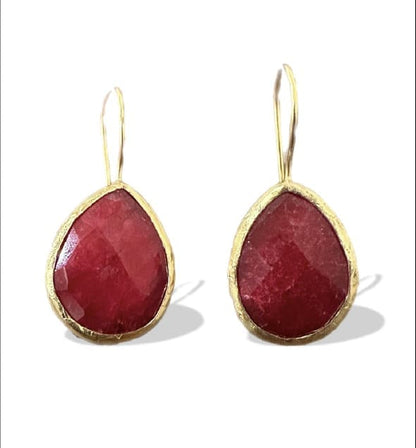 Handmade sustainable gold-plated ruby faceted teardrop drop earrings with white background 