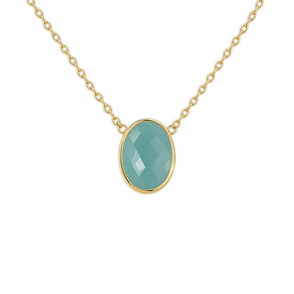 Close up of minimal gold chain faceted Aqua chalcedony pendant necklace on white background