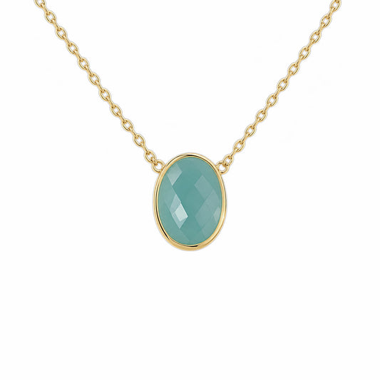 Close up of minimal gold chain faceted Aqua chalcedony pendant necklace on white background