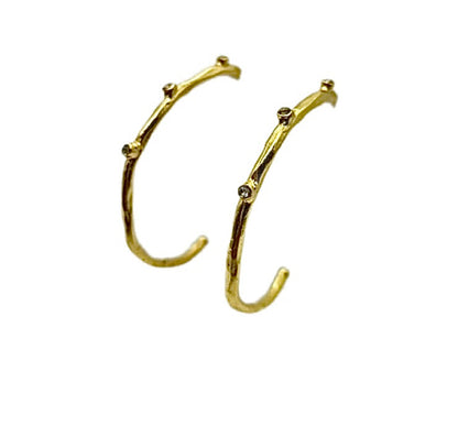 handmade 21 karat gold plated hammer finished hoop earrings with cz accents 