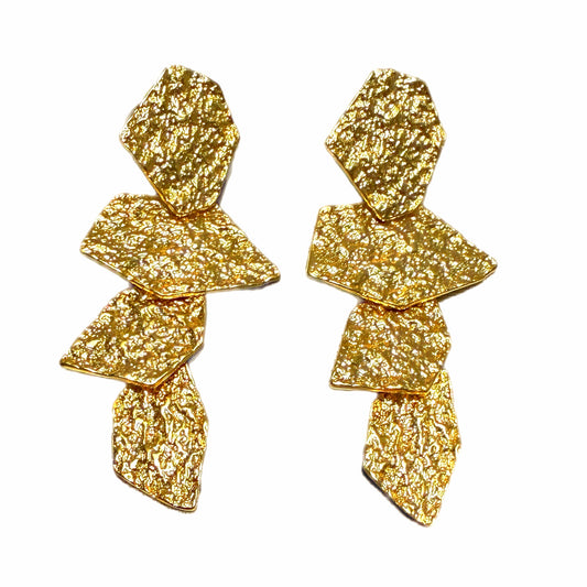 Gold plated foil textured geometric brass shaped dangle earrings on white background