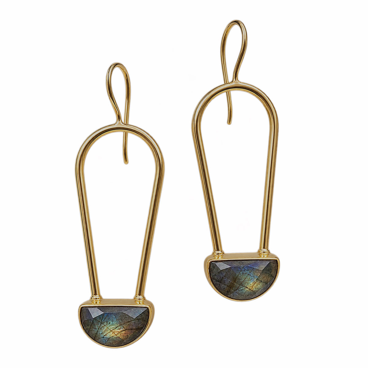 A pair of gold drop earrings with a teardrop-shaped gold frame and a faceted labradorite stone set in a semi-circular gold base, shown on a plain white background.