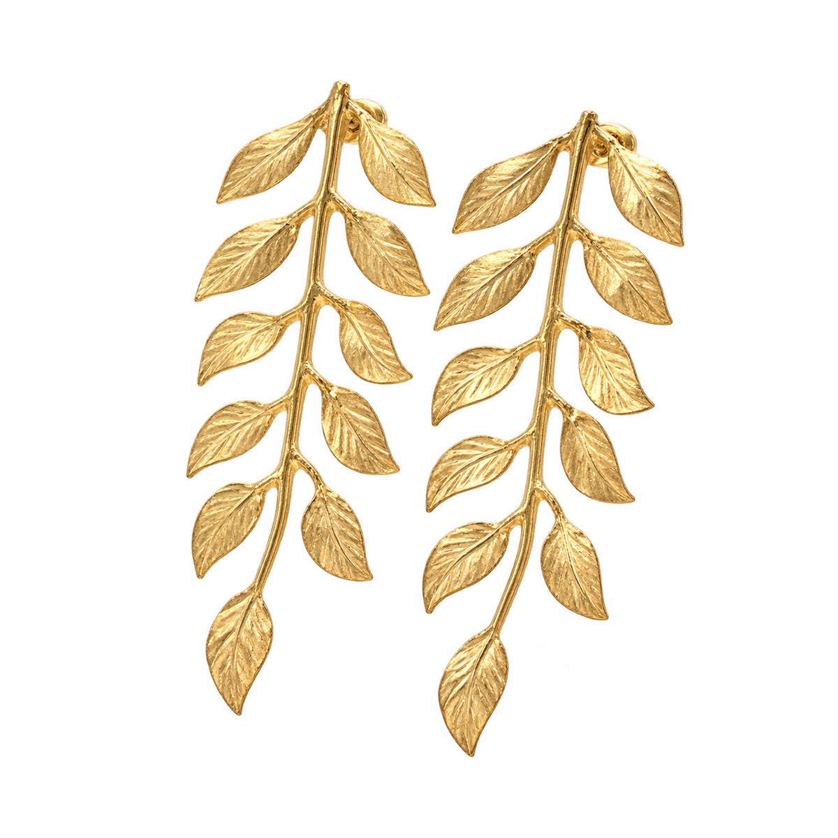 Handmade artisanal gold plated vine leaf earrings facing left on white background by Bebek jewels