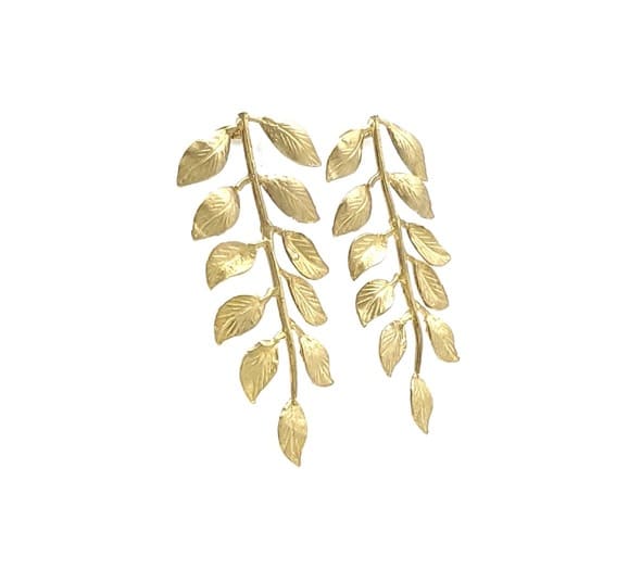 Handmade sustainable Gold-plated vine leaf earrings facing right with a white background