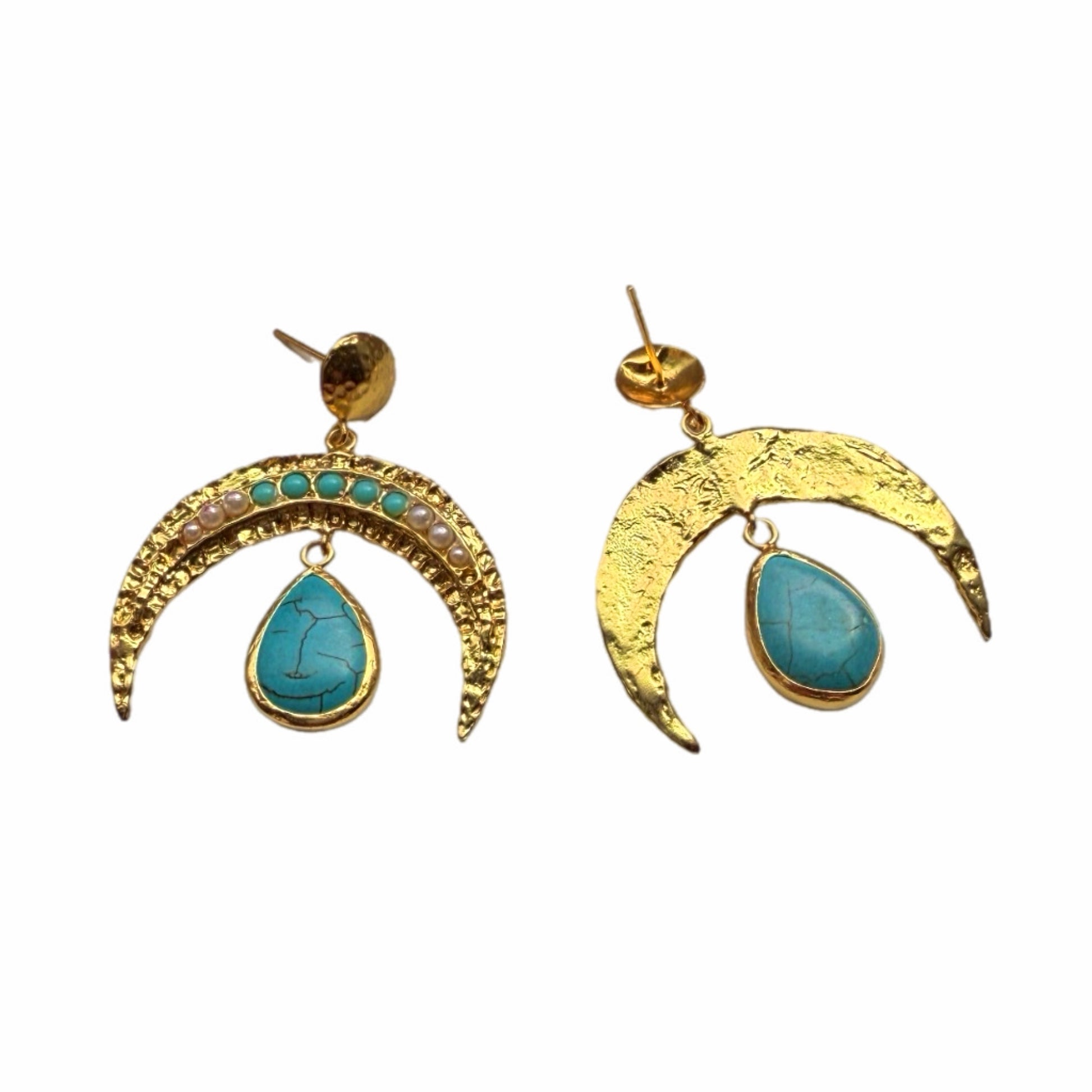A pair of handmade gold-plated crescent-shaped drop earrings with small turquoise and pearl gemstones along the top arch and a larger teardrop turquoise stone hanging below, with one backwards