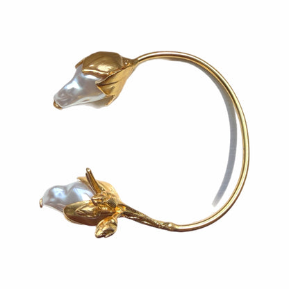 Handmade Gold-plated cuff bangle with floral design and baroque pearls Facing left 