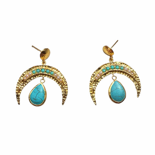 A pair of handmade gold-plated crescent horn drop earrings with small turquoise and pearl gemstones and a larger teardrop turquoise stone hanging below