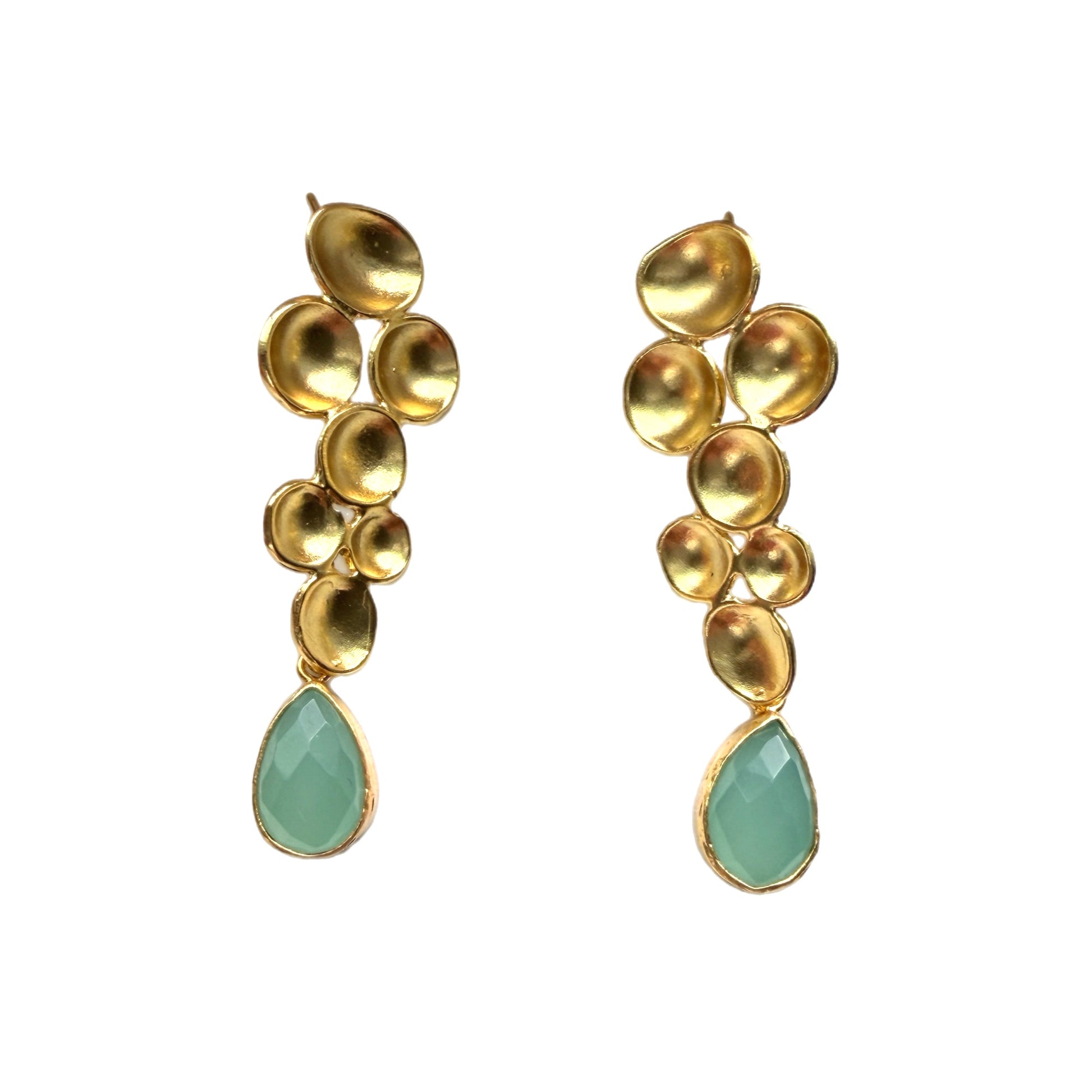 A pair of handmade gold drop earrings featuring a geometric design and a faceted aqua chalcedony teardrop gemstone at the bottom, set against a plain white background.