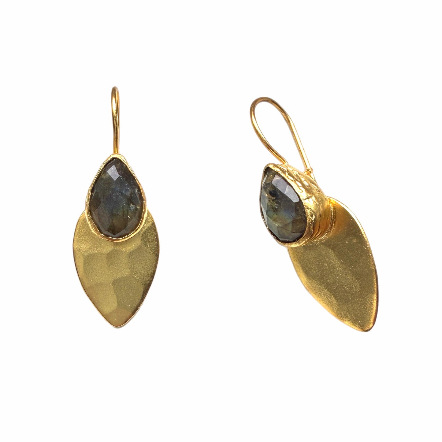 A pair of gold drop earrings with teardrop-shaped labradorite gemstone at the top and a larger hammered gold leaf-shaped drop Ok white backdrop 