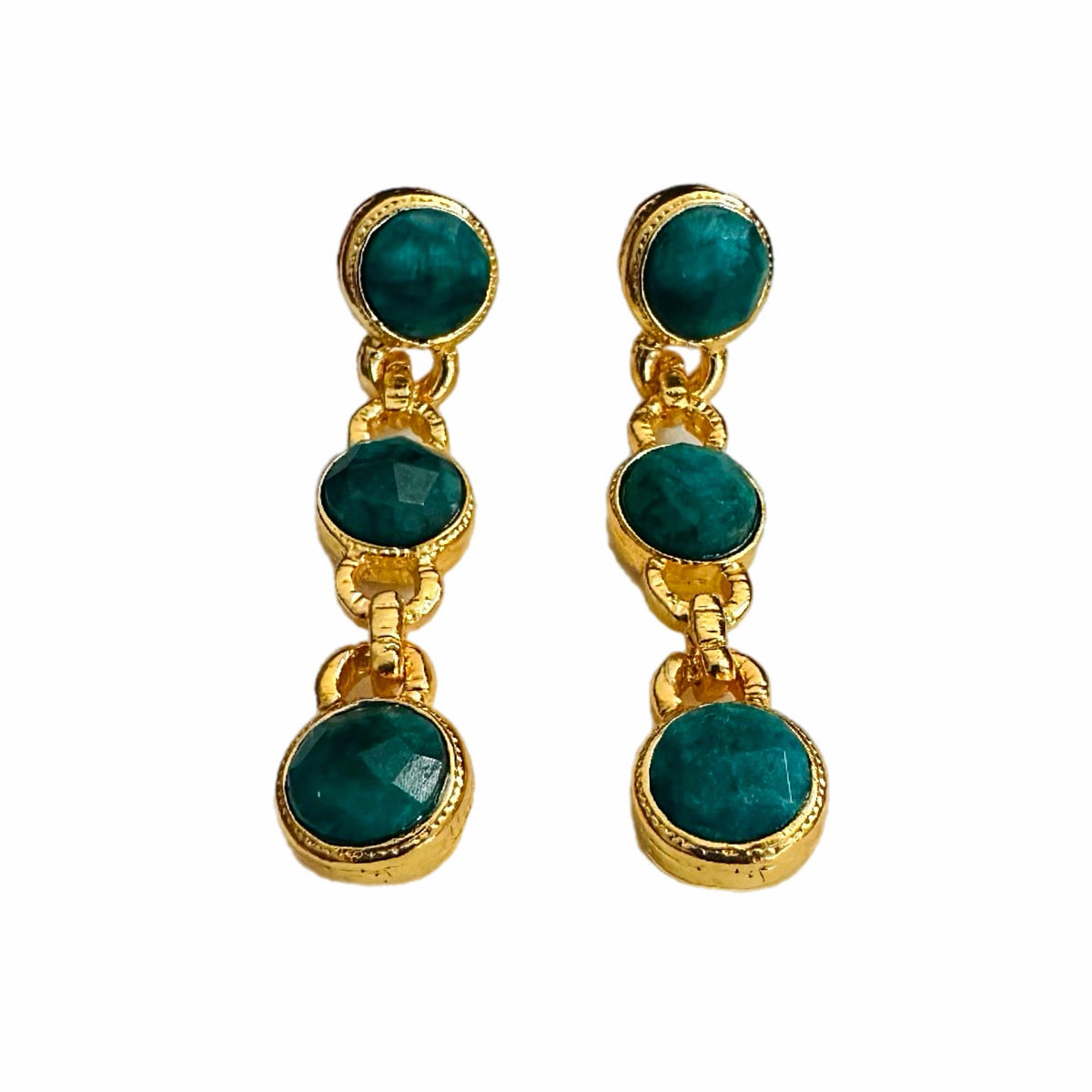 Handmade gold-plated multi-stone emerald and chain dangle earrings on white background 