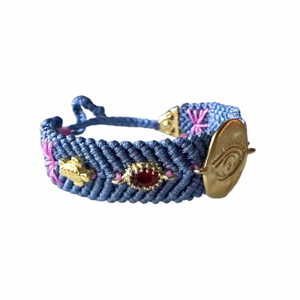 Slate gray handmade woven Bracelet with gold-plated evil eye charm and zircon crystals on a white surface