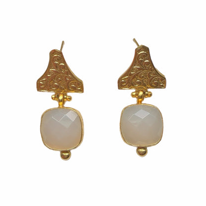 Handmade sustainable gold-plated faceted snow Quartz and Etruscan design drop earrings against a white background 