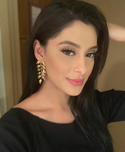 Bollywood dancing sensation Manpreet Toor wears black top and Handmade artisanal gold-plated vines earrings by Bebek Jewels 