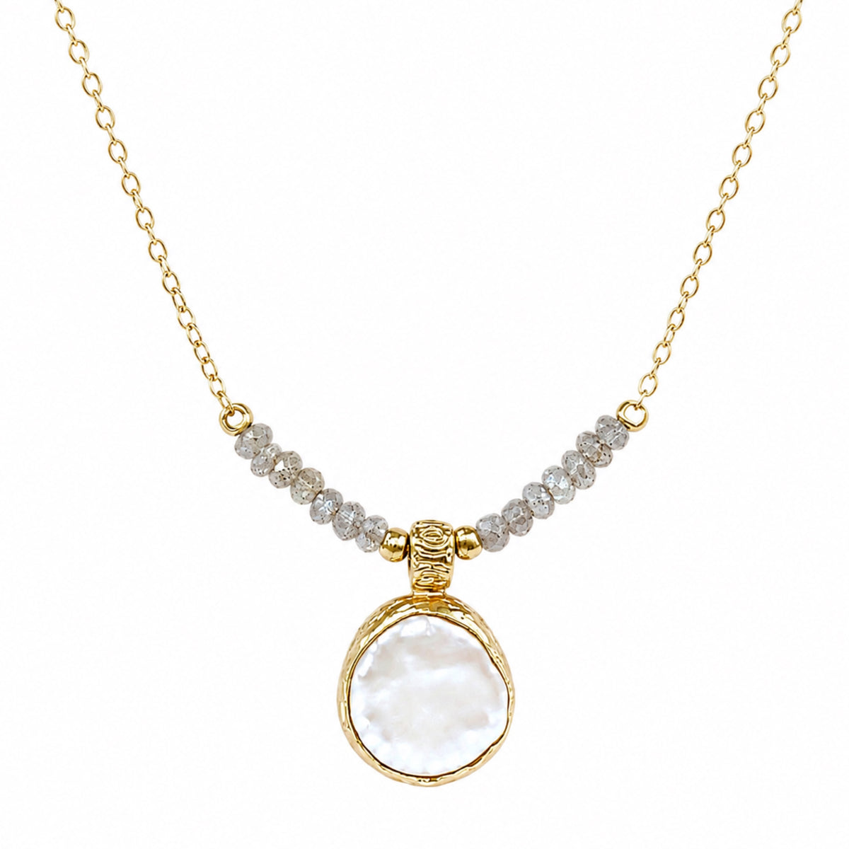 A gold chain minimal flat pearl pendant necklace with a row of small gray beads across upper center