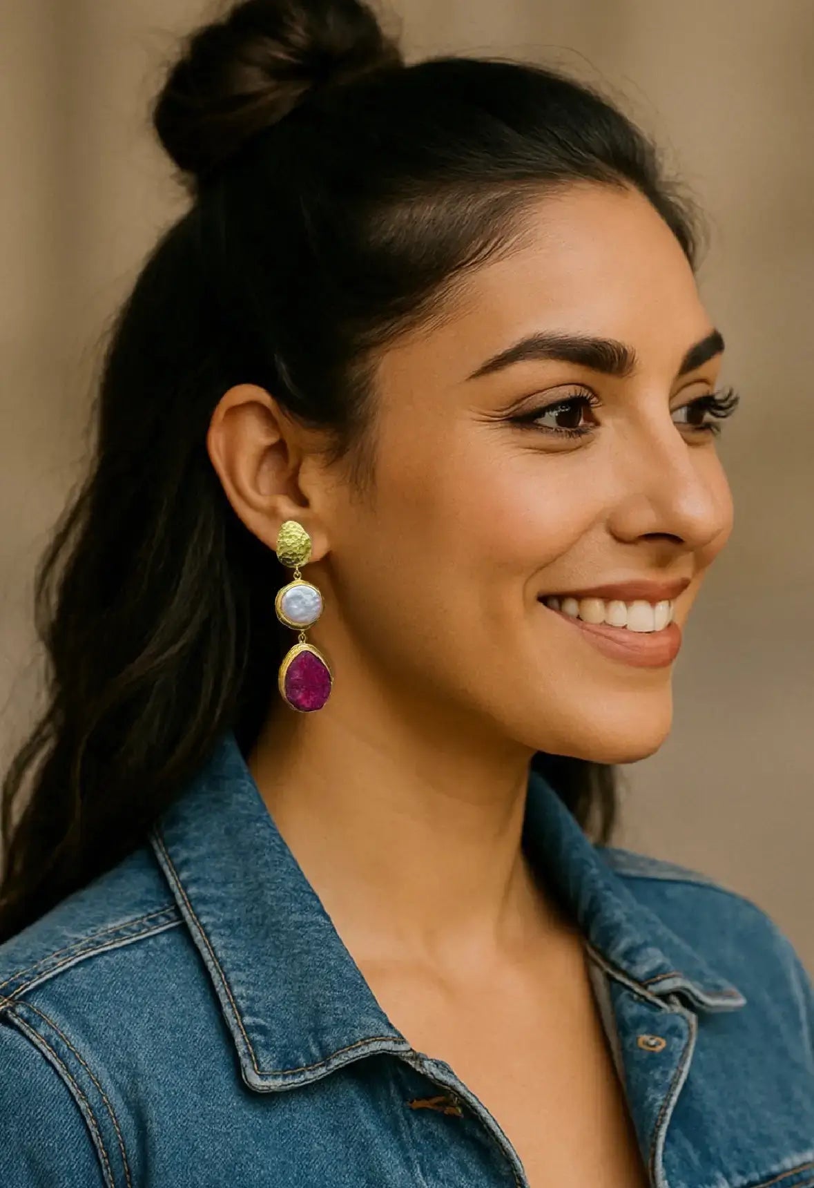 Model wearing Jean top and stunning handmade gold-plated ruby and flat pearl dangle earrings 