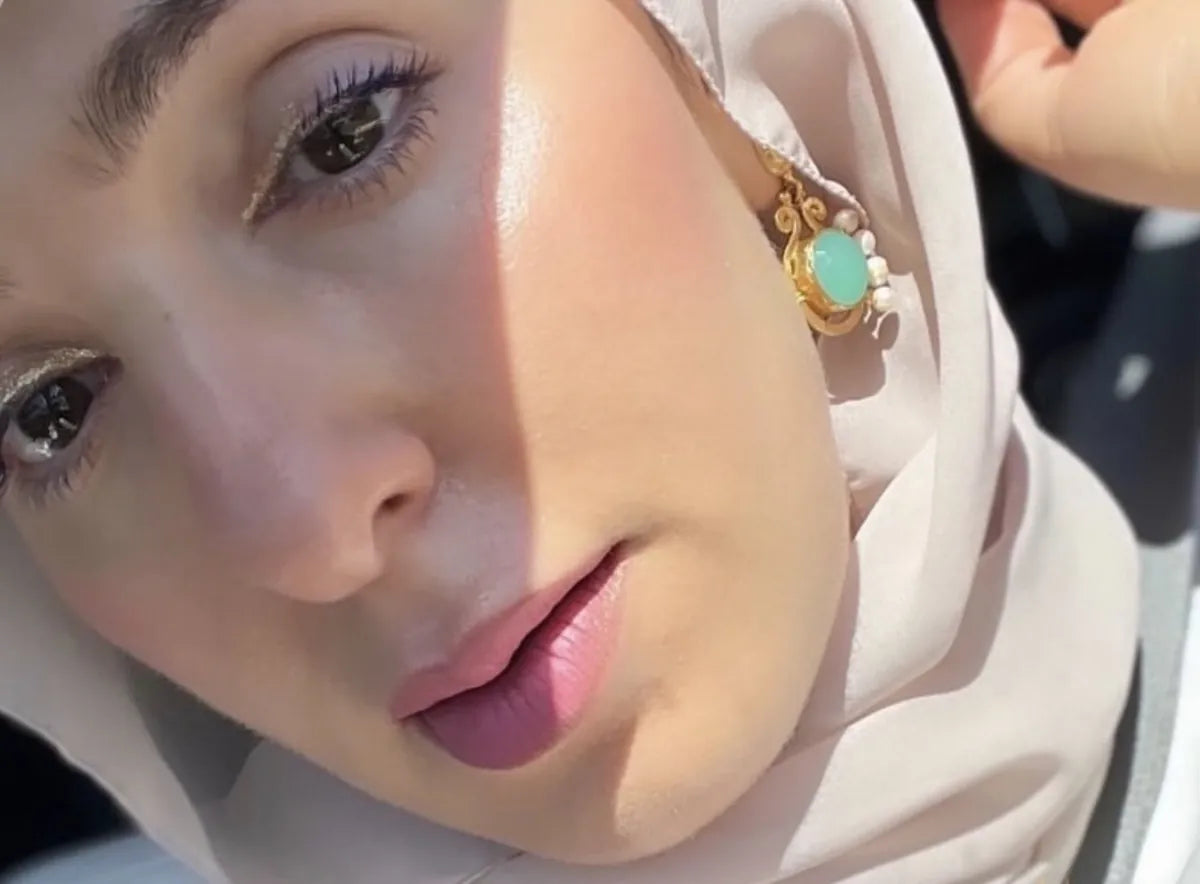 Hulu star Muslim matchmaker and comedian Yasmin Elhady wears baglama aqua chaledony earrings by Bebek Jewels  