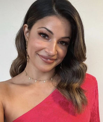 Richa Moorjani wearing pink dress and gold-plated artisanal vine leaf earrings by Bebek Jewels 