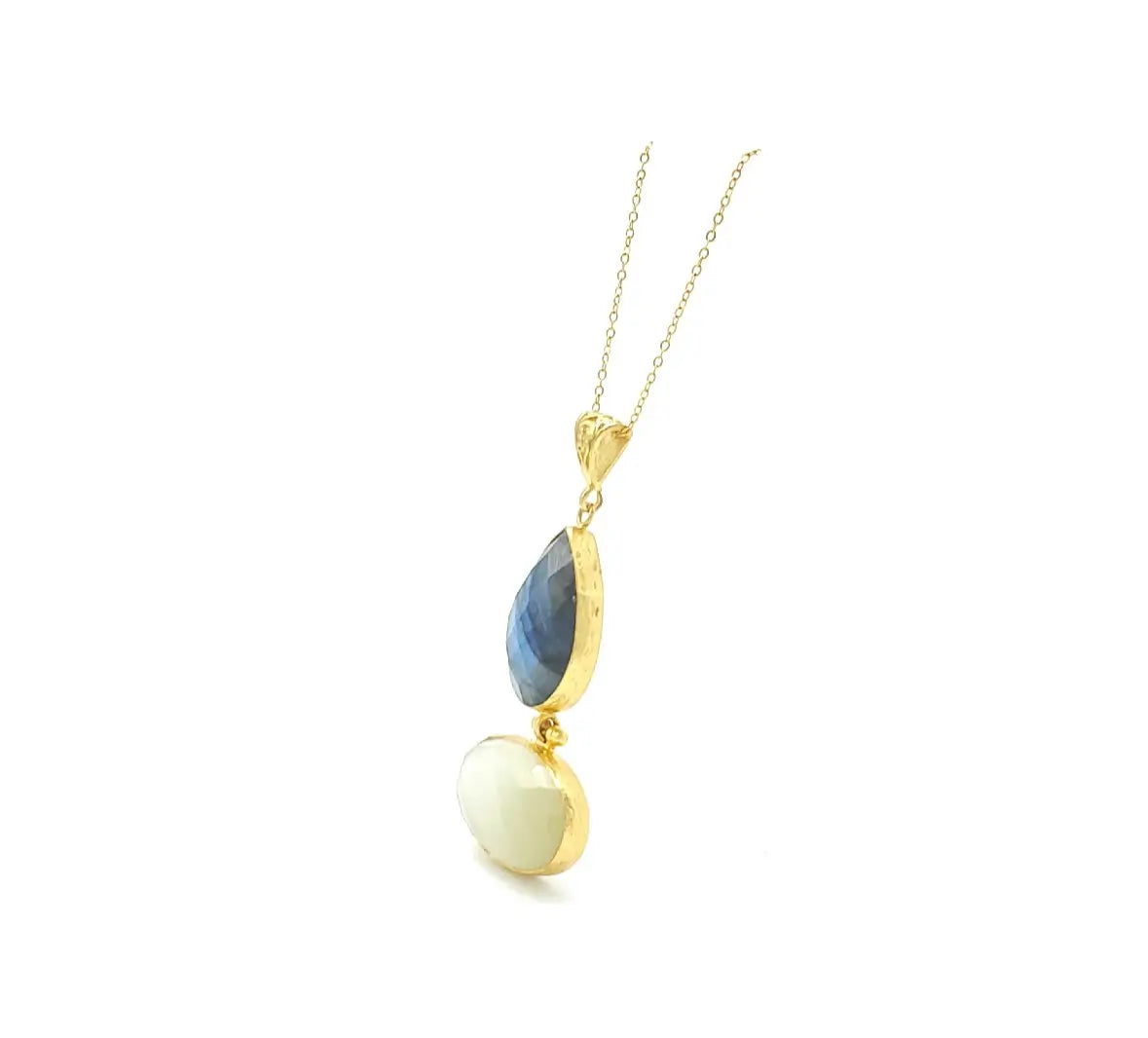 Side view of beautiful Gold-plated long necklace with labradorite and snow Quartz gemstones on a white background