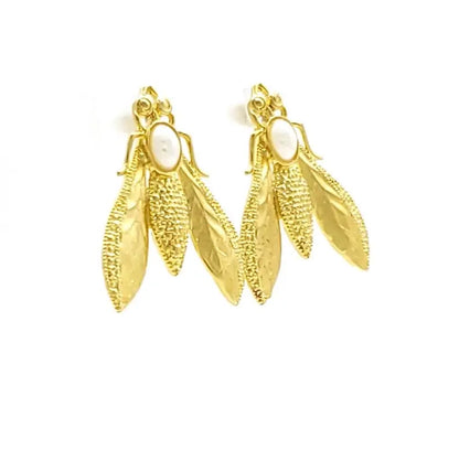 stylish handmade sustainable gold-plated bee earrings with pearl facing left 